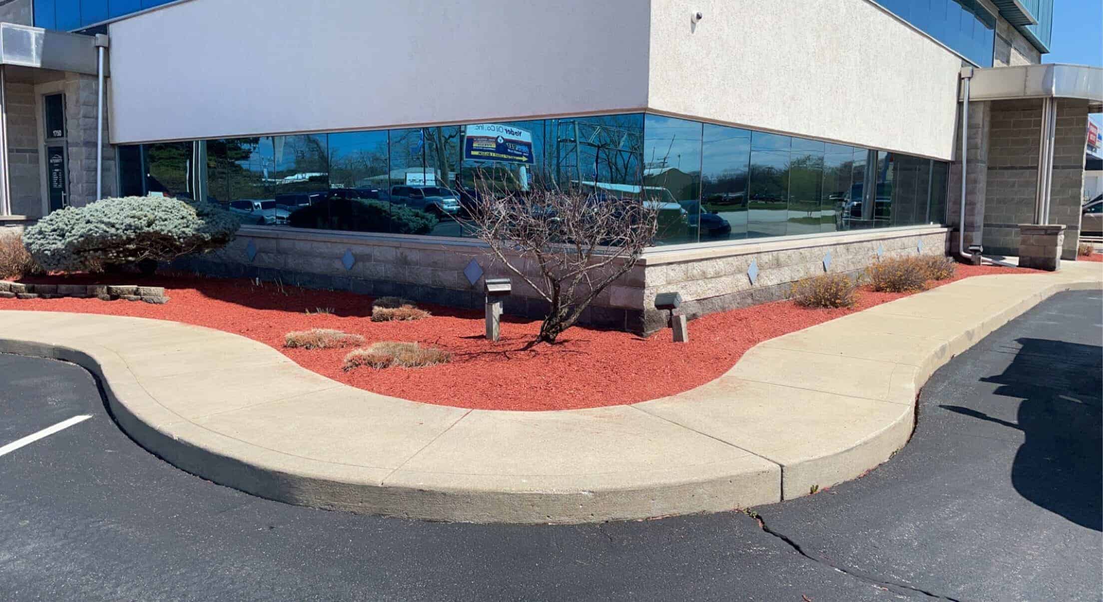 Plan commercial lawn maintenance according to specific standards