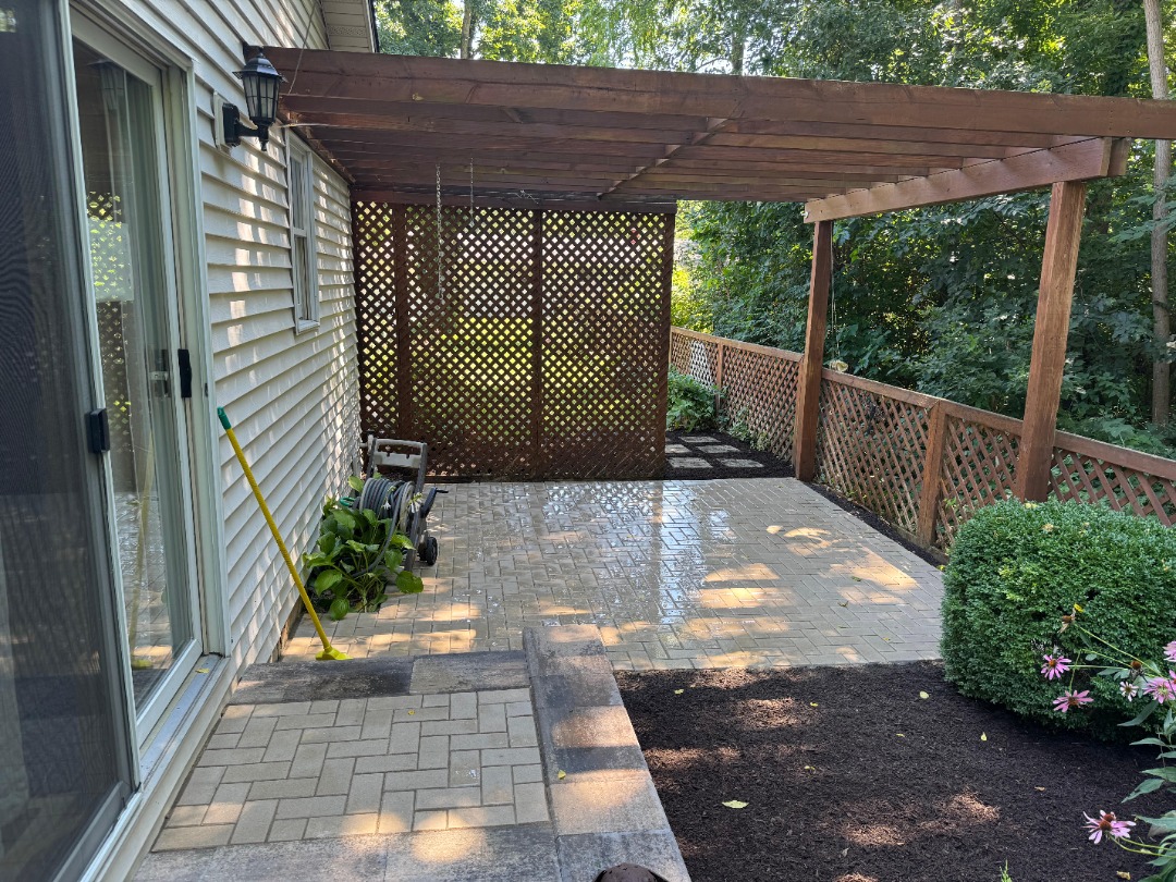 In-depth look at a happy customer's new outdoor patio/outdoor living space.