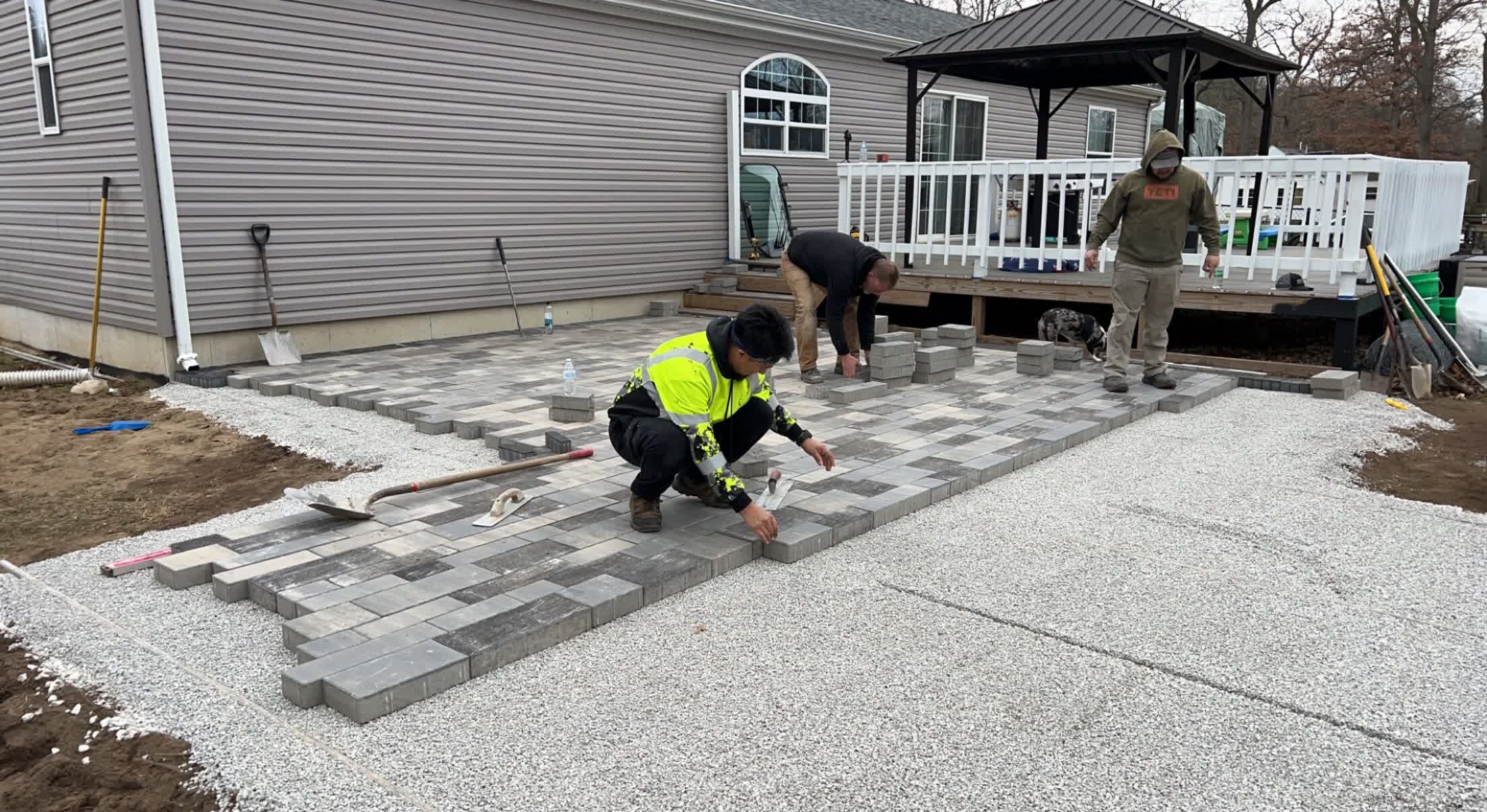 Our professional crew installing a paver patio.