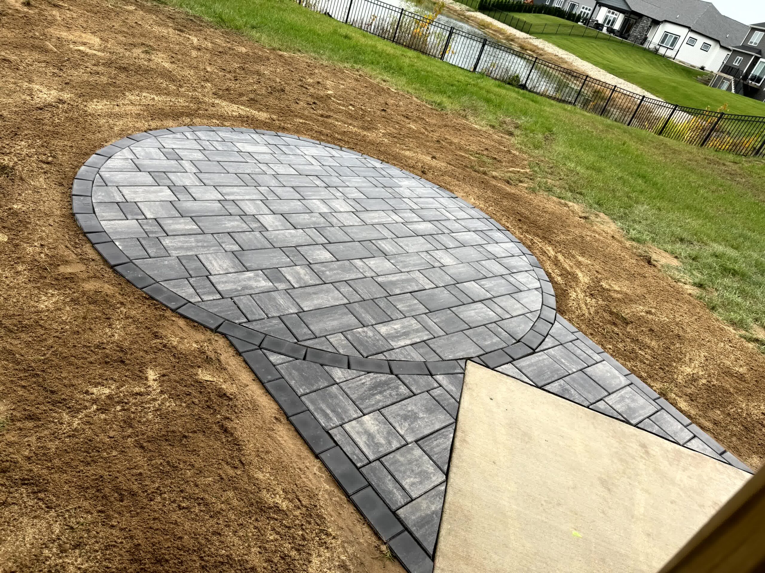 Our professional landscaping crew that completed a paver patio project.