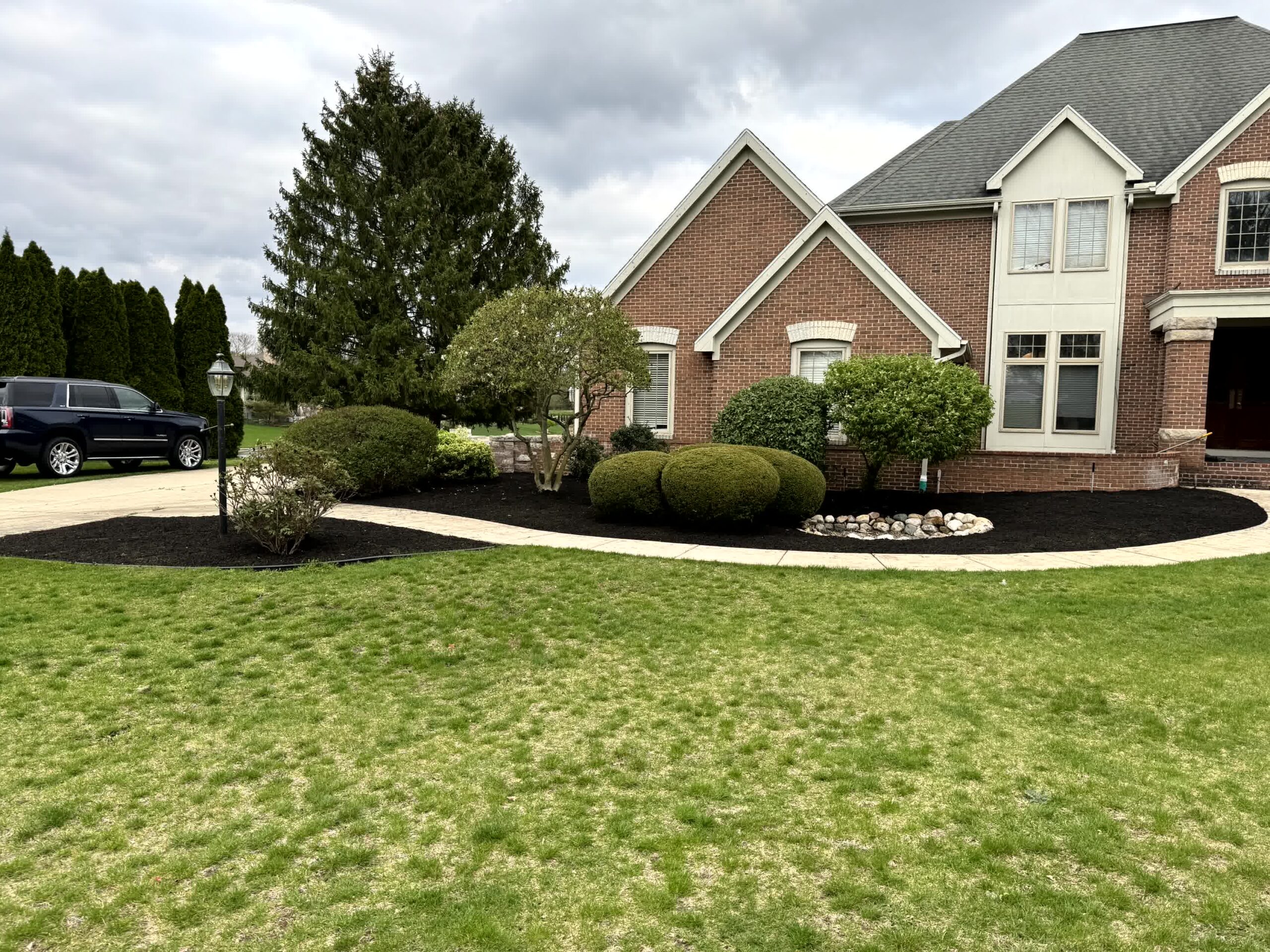 Another angle of the new mulch in a happy client's yard.