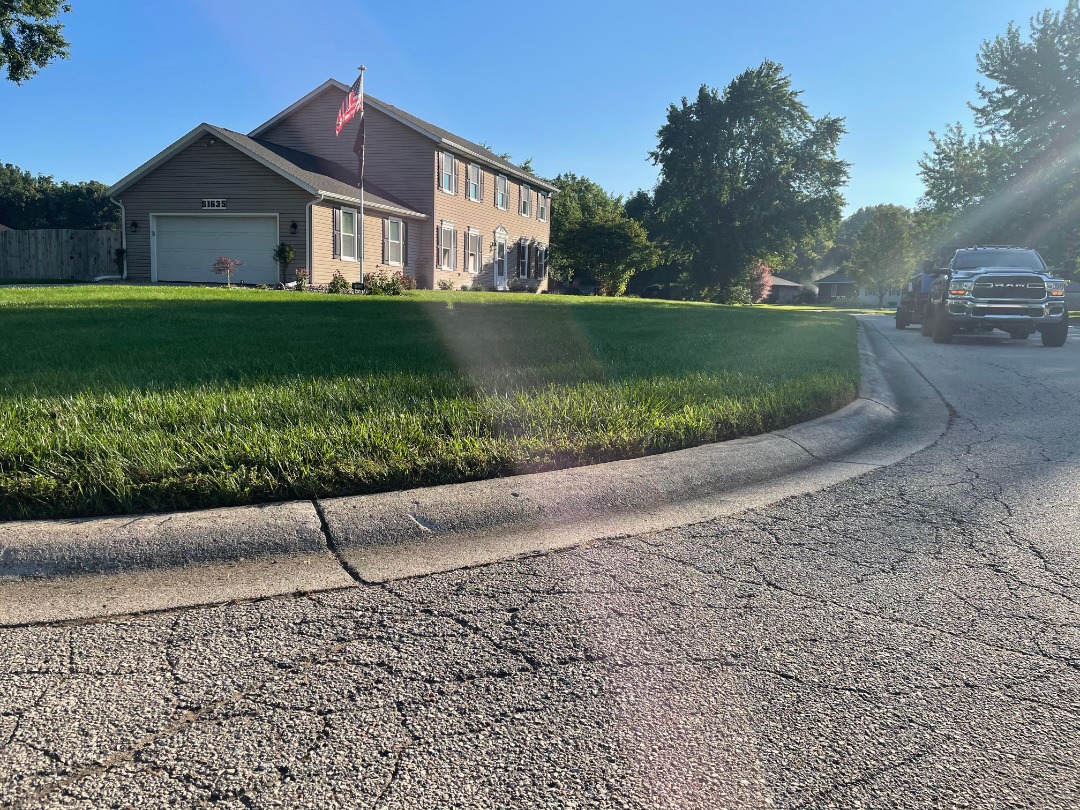 A perfectly cut lush lawn.